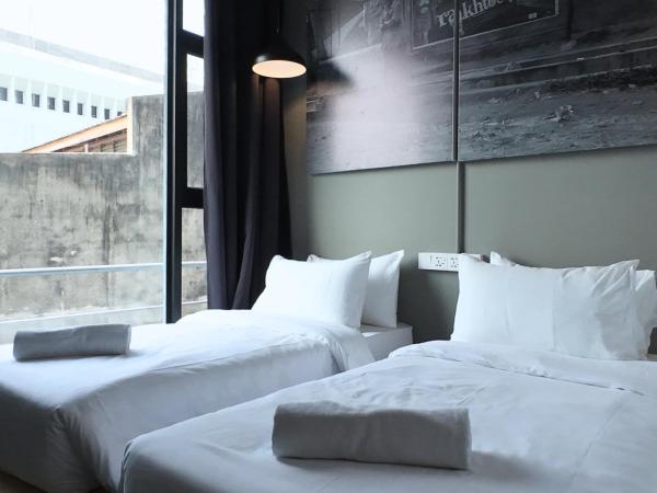 Rucksack Inn Premium Melaka : photo 2 de la chambre chambre lits jumeaux standard