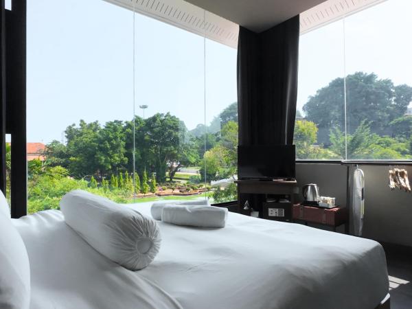 Rucksack Inn Premium Melaka : photo 4 de la chambre chambre lit king-size deluxe