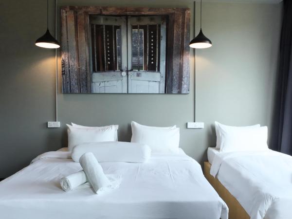 Rucksack Inn Premium Melaka : photo 5 de la chambre chambre triple