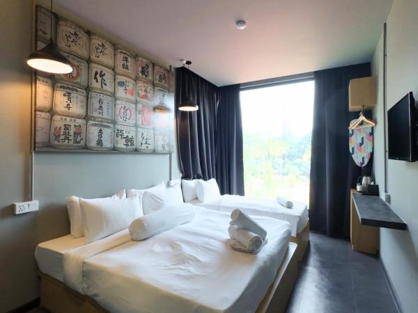 Rucksack Inn Premium Melaka : photo 7 de la chambre chambre triple