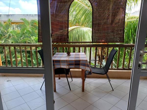 Le Palmier : photo 3 de la chambre chambre double - vue sur piscine