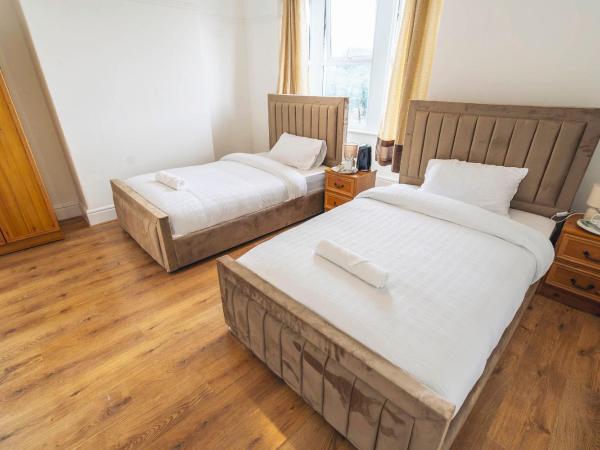 Majestic Inn : photo 5 de la chambre chambre double avec salle de bains commune