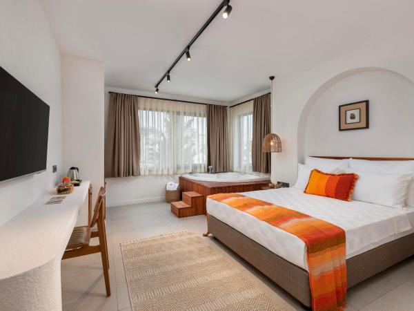 Azuu Boutique Hotel : photo 1 de la chambre suite avec baignoire spa