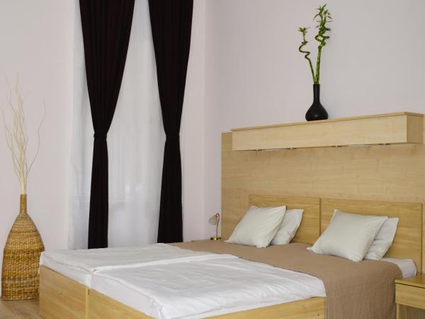 Centrooms House : photo 1 de la chambre chambre triple