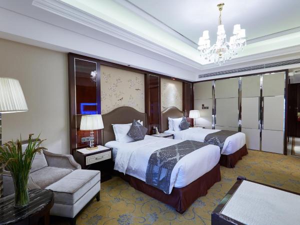 Tongli Lake Resort Phase II : photo 1 de la chambre chambre lits jumeaux - vue sur jardin 