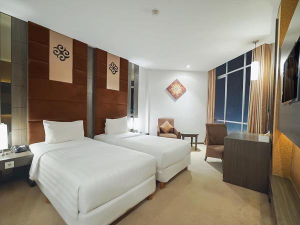 Grand Tjokro Jakarta : photo 2 de la chambre chambre lits jumeaux deluxe