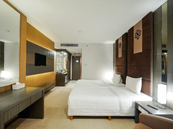 Grand Tjokro Jakarta : photo 3 de la chambre chambre lits jumeaux deluxe