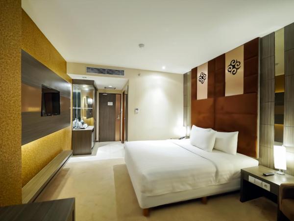 Grand Tjokro Jakarta : photo 2 de la chambre chambre lit king-size supérieure