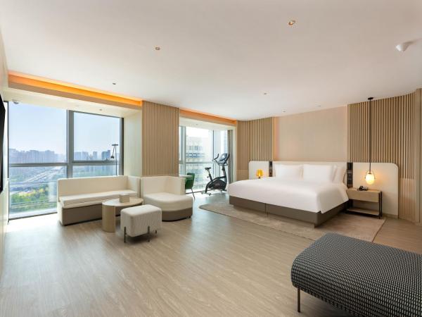 EVEN Hotel Qingdao Laoshan - an IHG Hotel : photo 1 de la chambre king suite with dynamic cycling