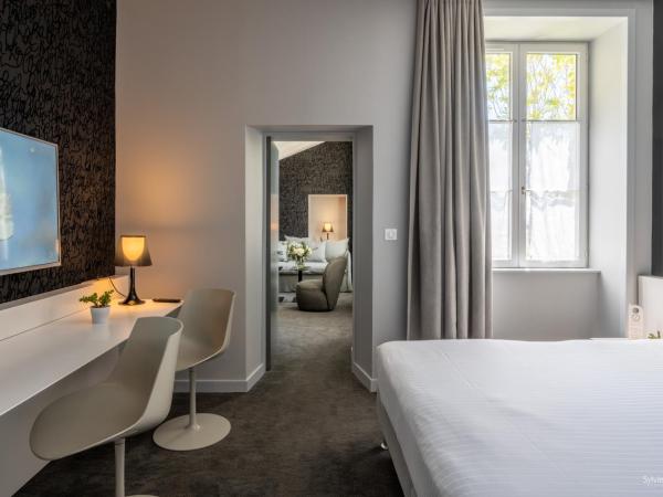 Hôtel La Monnaie Arty & Spa : photo 2 de la chambre suite aliénor d'aquitaine