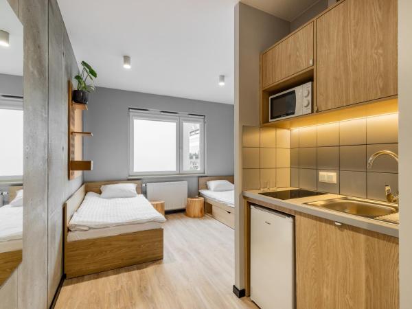 NextDoor Apartments : photo 6 de la chambre chambre lits jumeaux