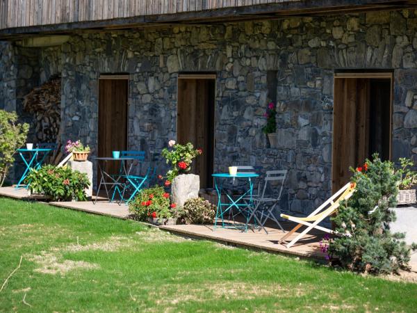 Les Mazots des Fées : photo 1 de la chambre chambre familiale avec terrasse