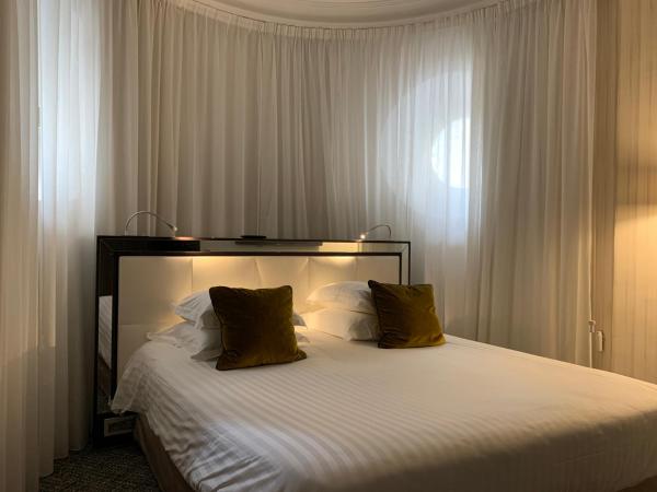 Hôtel Le Canberra : photo 2 de la chambre suite rotonde