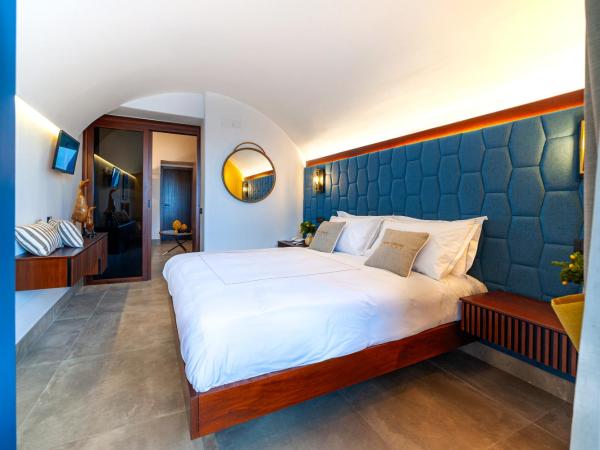 Punta Chiarito Resort : photo 1 de la chambre suite avec baignoire spa