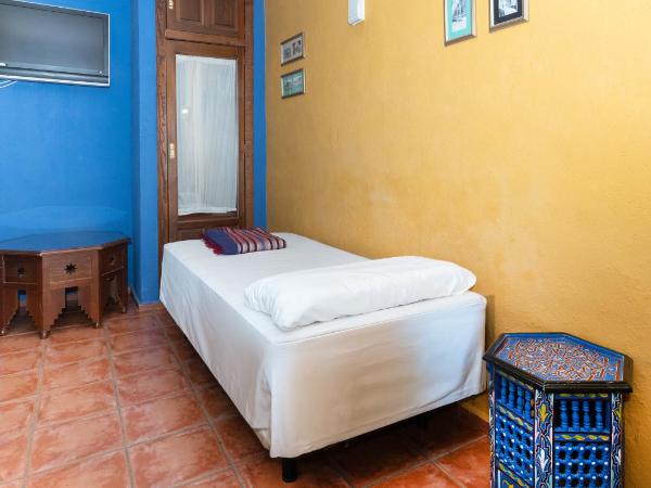 Safestay Cordoba Mezquita Catedral : photo 1 de la chambre lit dans dortoir mixte de 4 lits avec salle de bains privative