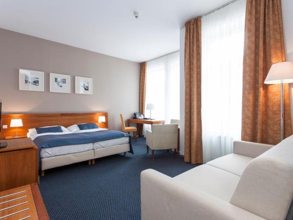 Hotel Carol : photo 3 de la chambre chambre deluxe double ou lits jumeaux