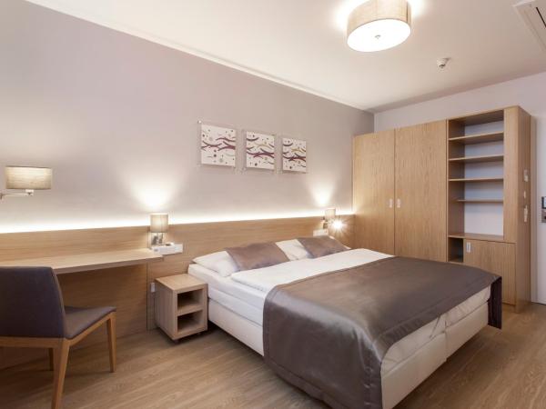 Hotel Carol : photo 3 de la chambre suite familiale