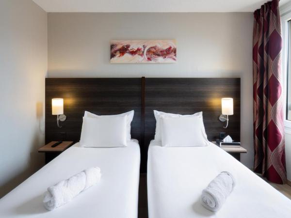 Kyriad Belfort Centre Gare : photo 4 de la chambre chambre lits jumeaux