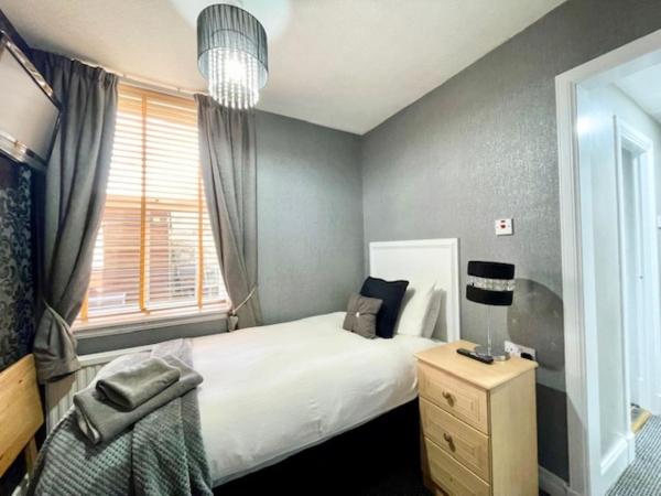 Vaila Guest House : photo 1 de la chambre chambre simple avec salle de bains privative