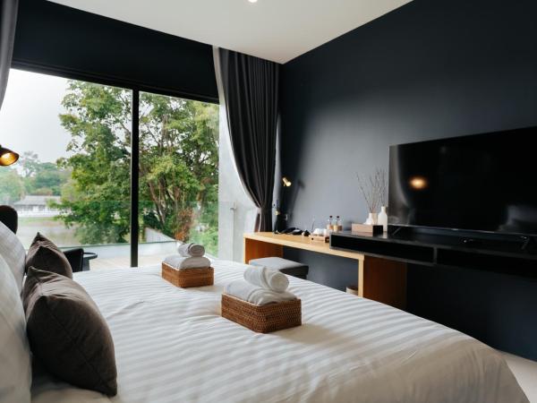 The Grandiose Hotel Chiang Rai เดอะแกรนด์ดิโอสเชียงราย : photo 8 de la chambre chambre double ou lits jumeaux deluxe - vue sur rivière