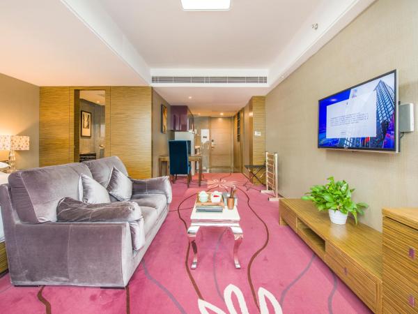La Perle International Hotel - Free shuttle between hotel and Exhibition Center during Canton Fair & Exhibitor registration Counter : photo 6 de la chambre chambre lit queen-size deluxe