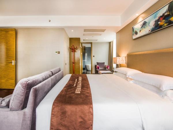 La Perle International Hotel - Free shuttle between hotel and Exhibition Center during Canton Fair & Exhibitor registration Counter : photo 3 de la chambre suite exécutive