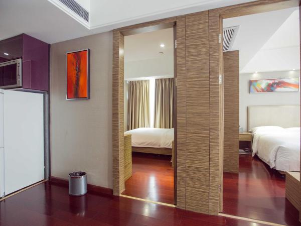 La Perle International Hotel - Free shuttle between hotel and Exhibition Center during Canton Fair & Exhibitor registration Counter : photo 2 de la chambre suite familiale deluxe