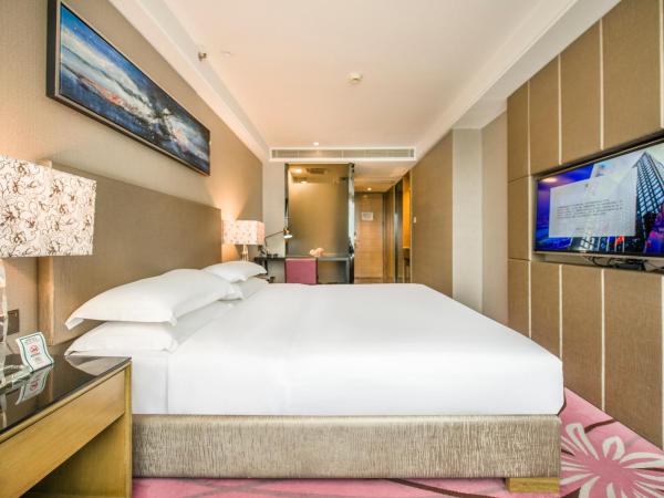 La Perle International Hotel - Free shuttle between hotel and Exhibition Center during Canton Fair & Exhibitor registration Counter : photo 2 de la chambre chambre exécutive lit queen-size