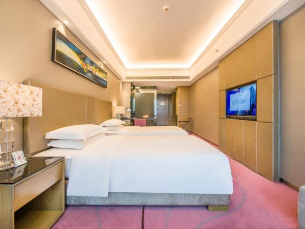 La Perle International Hotel - Free shuttle between hotel and Exhibition Center during Canton Fair & Exhibitor registration Counter : photo 1 de la chambre chambre lits jumeaux exécutive