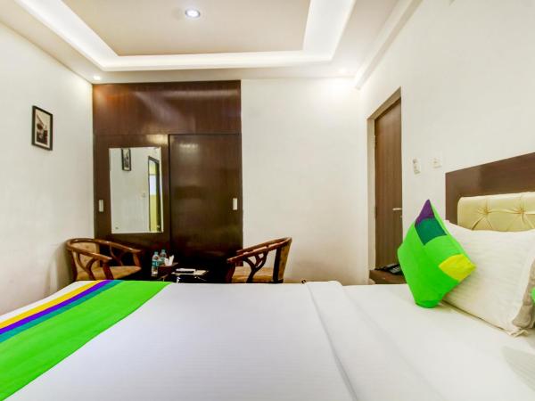 Treebo The Sai Leela Suites R T Nagar : photo 7 de la chambre chambre double standard