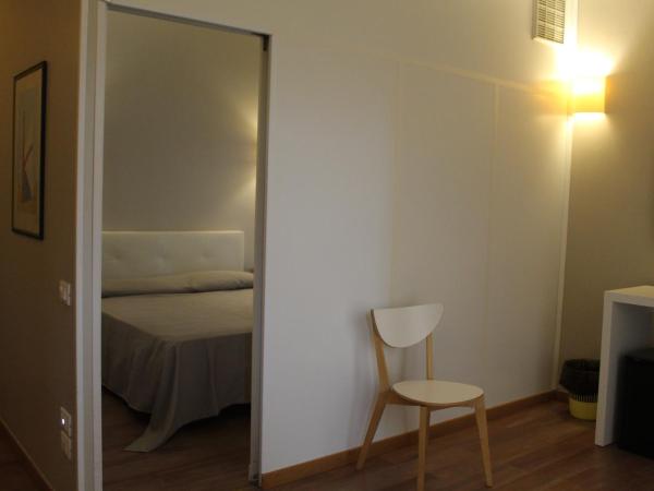 Ute Hotel : photo 6 de la chambre chambre quadruple
