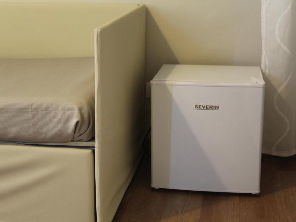 Ute Hotel : photo 7 de la chambre chambre quadruple