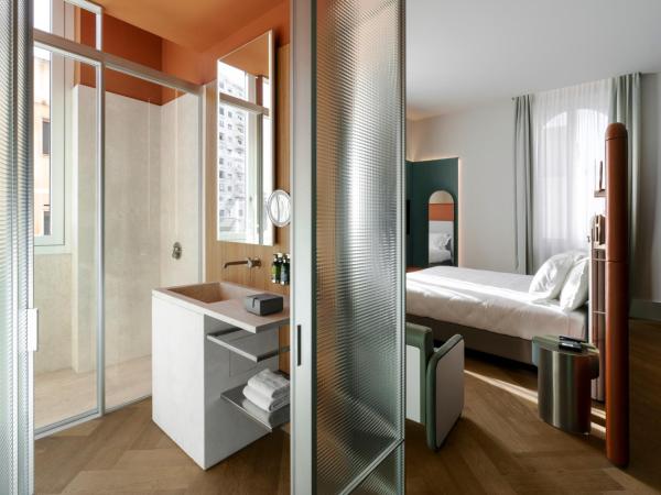 Palazzo Tirso MGallery Cagliari : photo 6 de la chambre chambre double deluxe