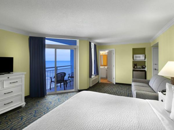 Paradise Resort : photo 3 de la chambre chambre king avec vue partielle sur l'océan