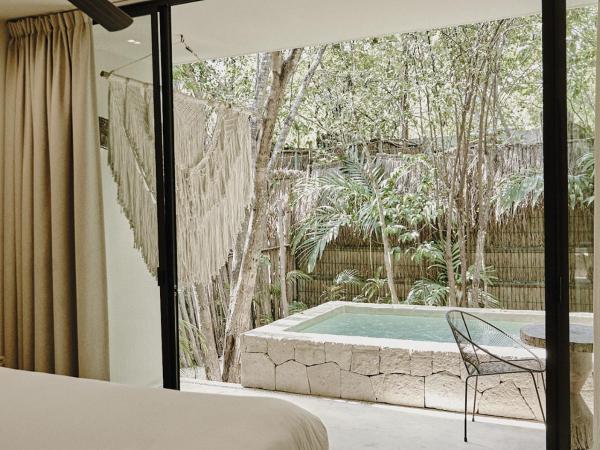 Una Vida : photo 6 de la chambre chambre tropicale avec petite piscine et jardin privé