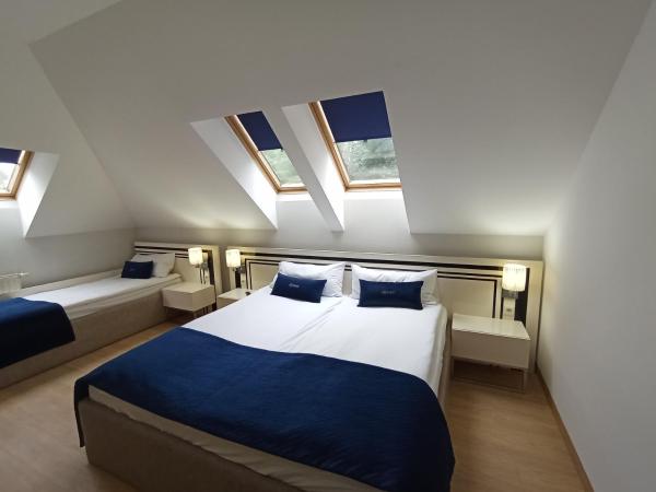 Aparthotel Kontrast : photo 3 de la chambre chambre triple