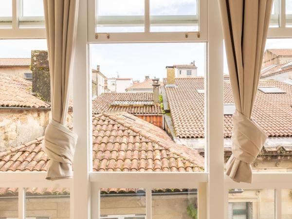 Hotel Montes : photo 7 de la chambre chambre lits jumeaux