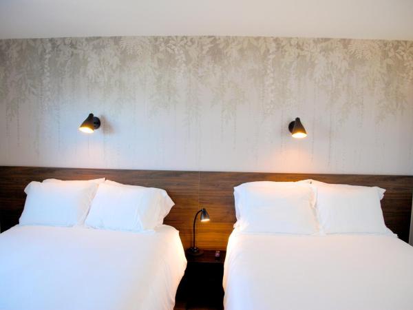 Uptown Inn - Limited Service Apart-Hotel : photo 1 de la chambre studio apartment with queen bed- freeway facing