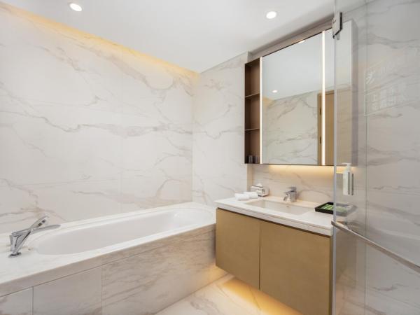 苏州山塘街华贸姑苏里服务公寓 : photo 7 de la chambre suite familiale