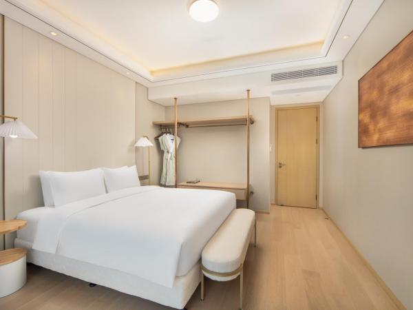 苏州山塘街华贸姑苏里服务公寓 : photo 3 de la chambre suite 2 chambres