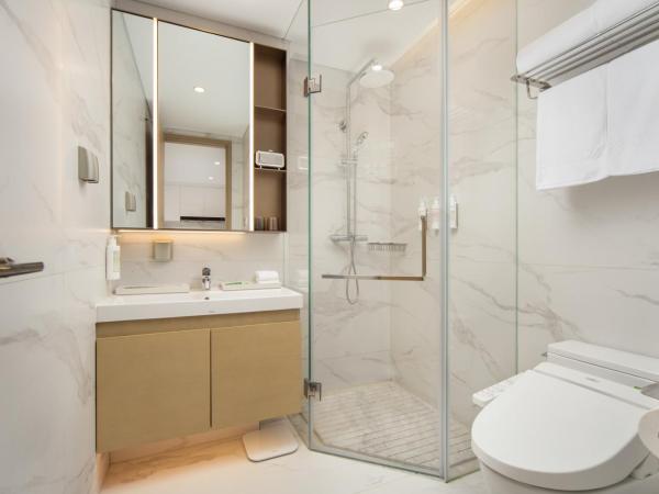 苏州山塘街华贸姑苏里服务公寓 : photo 6 de la chambre chambre double supérieure