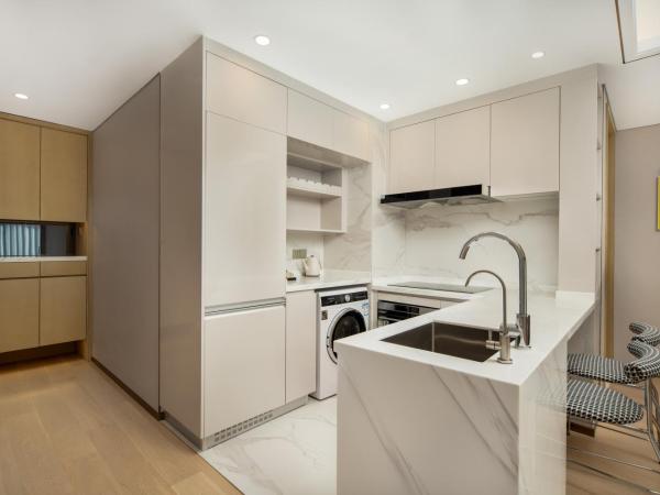 苏州山塘街华贸姑苏里服务公寓 : photo 5 de la chambre studio