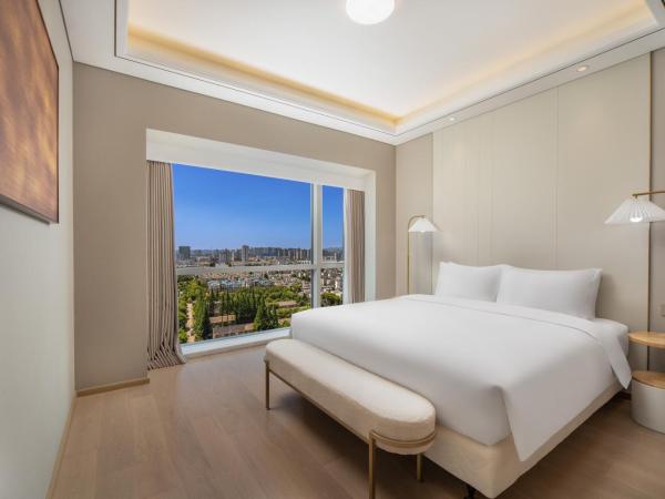 苏州山塘街华贸姑苏里服务公寓 : photo 2 de la chambre suite 2 chambres