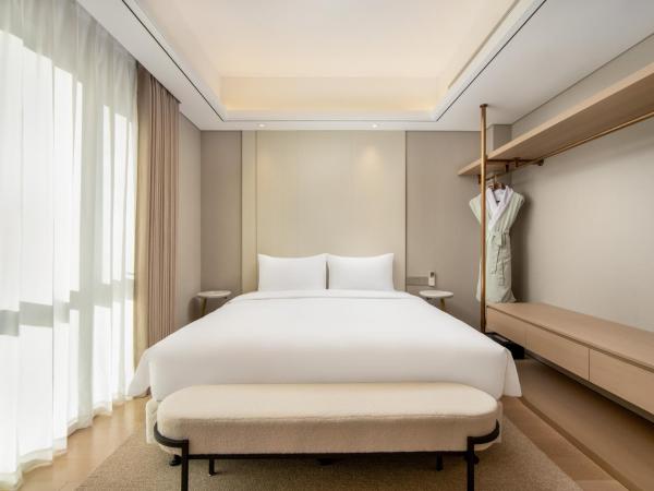 苏州山塘街华贸姑苏里服务公寓 : photo 1 de la chambre chambre double supérieure