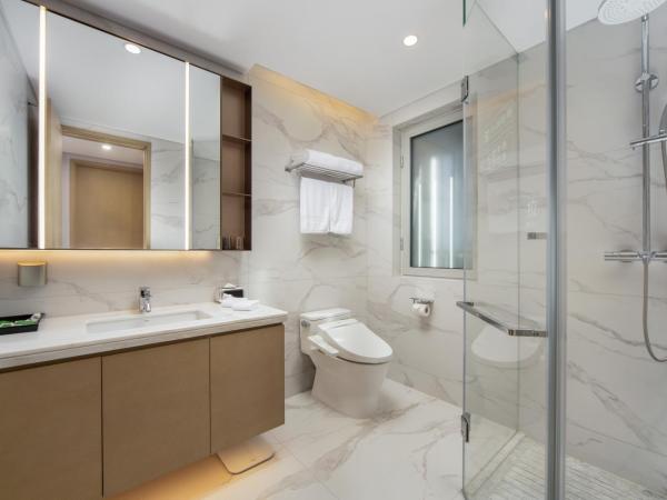 苏州山塘街华贸姑苏里服务公寓 : photo 6 de la chambre studio