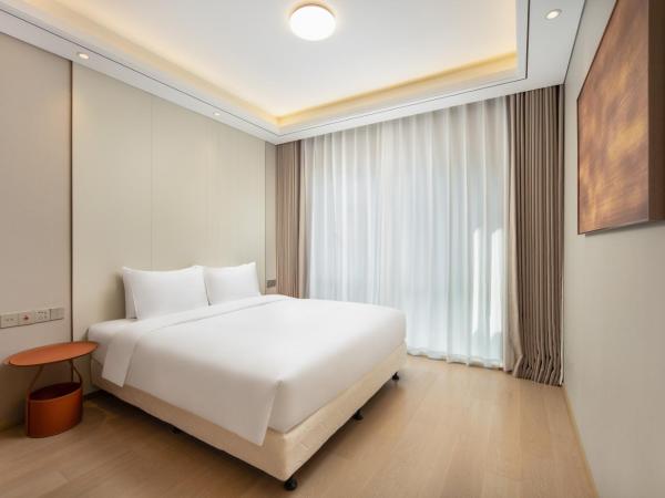 苏州山塘街华贸姑苏里服务公寓 : photo 3 de la chambre studio