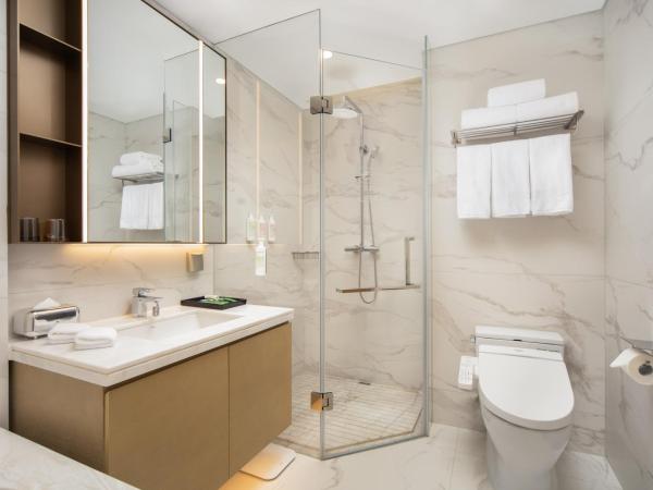 苏州山塘街华贸姑苏里服务公寓 : photo 9 de la chambre suite familiale