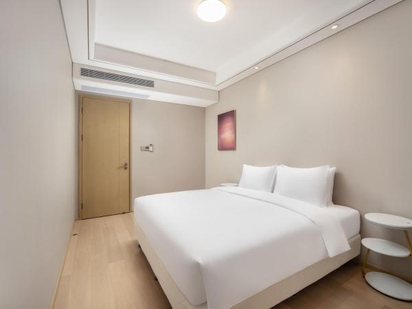 苏州山塘街华贸姑苏里服务公寓 : photo 3 de la chambre suite familiale