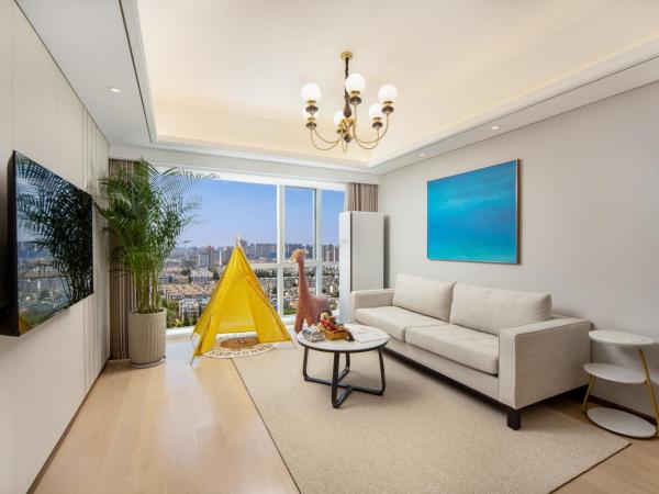 苏州山塘街华贸姑苏里服务公寓 : photo 1 de la chambre suite familiale