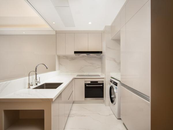 苏州山塘街华贸姑苏里服务公寓 : photo 6 de la chambre suite familiale